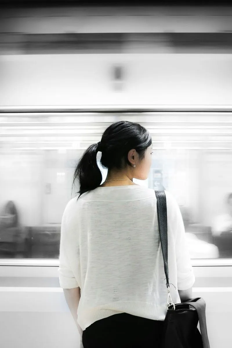 Subway Girl - Text Behind Image Example